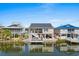 Waterfront home with a deck and stairs at 403 36Th Ave. N, North Myrtle Beach, SC 29582