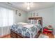 Bright bedroom with a double bed and ceiling fan at 4306 Princeton Dr., Little River, SC 29566