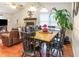 Dining area with wood table and black chairs at 4306 Princeton Dr., Little River, SC 29566