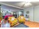 Main bedroom sitting area with two floral armchairs at 4306 Princeton Dr., Little River, SC 29566