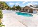 Community pool with surrounding patio and seating area at 4306 Princeton Dr., Little River, SC 29566