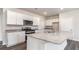 Kitchen island with granite countertop and white cabinets at 463 Acosta Circle, Conway, SC 29527