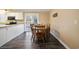 Bright dining room with wooden table and chairs, adjacent to the kitchen at 4637 Dogwood St., Loris, SC 29569