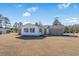 Brick house with sunroom and large backyard at 4637 Dogwood St., Loris, SC 29569