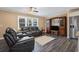 Living room with a entertainment center and recliners at 4637 Dogwood St., Loris, SC 29569