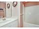 Simple bathroom with a tub and shower at 4660 Lightkeepers Way # 37A, Little River, SC 29566