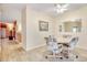 Bright dining area with a table and four chairs at 4660 Lightkeepers Way # 37A, Little River, SC 29566