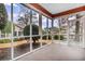 Relaxing screened porch overlooking a backyard at 4660 Lightkeepers Way # 37A, Little River, SC 29566