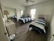 Bedroom with twin beds and shared bathroom at 4811 Magnolia Lake Dr. # 105, Myrtle Beach, SC 29577