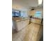 Modern kitchen featuring granite countertops and light wood cabinets at 4811 Magnolia Lake Dr. # 105, Myrtle Beach, SC 29577