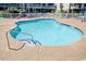 Community pool with ample deck space for lounging at 4811 Magnolia Lake Dr. # 105, Myrtle Beach, SC 29577