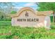 Landscaped entrance sign for North Beach community at 4910 N Market St. # M9-R2, North Myrtle Beach, SC 29582