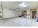 Garage with storage shelving and extra door at 4910 N Market St. # M9-R2, North Myrtle Beach, SC 29582