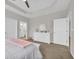 Spacious bedroom with white dresser and en-suite bathroom at 520 Shellbark Dr., Longs, SC 29568