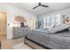 Main bedroom with gray dresser and plenty of natural light at 5353 Knobcone Loop # C-103, Myrtle Beach, SC 29577