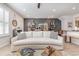 Spacious living room featuring a curved sofa and coffee table at 5353 Knobcone Loop # C-103, Myrtle Beach, SC 29577