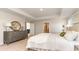 Main bedroom with plush carpeting, neutral tones and ensuite bathroom access at 554 Haven View Way, Murrells Inlet, SC 29576