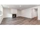 Living room with fireplace and hardwood flooring at 558 Haven View Way, Murrells Inlet, SC 29576