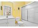 Clean bathroom with shower/tub combo and yellow walls at 5750 Oyster Catcher Dr. # 932, North Myrtle Beach, SC 29582