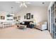 Living room with dark sofa, and view of dining area at 5750 Oyster Catcher Dr. # 932, North Myrtle Beach, SC 29582