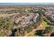 Aerial view of community with pool, golf course, and buildings at 5825 Catalina Dr. # 1234, North Myrtle Beach, SC 29582