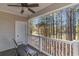 Balcony with wooded view, ceiling fan and door at 5825 Catalina Dr. # 1234, North Myrtle Beach, SC 29582