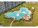 Large resort-style pool with multiple areas for lounging and swimming at 5825 Catalina Dr. # 1234, North Myrtle Beach, SC 29582