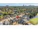 Aerial view of a house and neighborhood, showing its location and proximity to golf course and water at 5913 Country Club Dr., Myrtle Beach, SC 29577