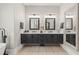 Double vanity bathroom with modern dark cabinets and plenty of counter space at 5913 Country Club Dr., Myrtle Beach, SC 29577