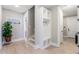 Hallway with built-in bench, coat hooks and stairs at 5913 Country Club Dr., Myrtle Beach, SC 29577