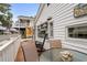 Deck with table and chairs, overlooking street at 6001 - 1861 S Kings Hwy., Myrtle Beach, SC 29575