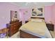 Bedroom with a large bed, dresser, and en-suite bathroom at 601 37Th Ave. N # C, Myrtle Beach, SC 29577