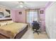 Bright bedroom with a large bed, workspace and double closets at 601 37Th Ave. N # C, Myrtle Beach, SC 29577