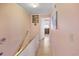 Upstairs hallway with light walls and wood floors, leading to bedrooms and bathroom at 601 37Th Ave. N # C, Myrtle Beach, SC 29577