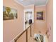 Upper hallway with artwork and access to bedrooms at 601 37Th Ave. N # C, Myrtle Beach, SC 29577