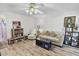 Living room with light wood flooring, comfy sofa, and built-in shelving at 601 37Th Ave. N # C, Myrtle Beach, SC 29577