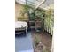 Small patio with table, grill, and small plants at 601 37Th Ave. N # C, Myrtle Beach, SC 29577