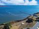 Aerial view of waterfront property with pier and calm water at 602 Olive St., Georgetown, SC 29440