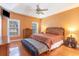 Main bedroom with hardwood floors and ceiling fan at 604 Ellis Dr., Conway, SC 29526