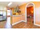 Kitchen with breakfast bar and view into adjacent living area at 604 Ellis Dr., Conway, SC 29526