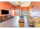 Living room with tile floors, fireplace, and large TV at 604 Ellis Dr., Conway, SC 29526