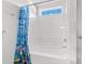 Bathroom with tub shower and colorful curtain at 605 West Perry Rd., Myrtle Beach, SC 29579