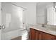 Simple bathroom with single vanity and tub at 605 West Perry Rd., Myrtle Beach, SC 29579