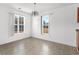 Simple dining area with tile floor and large windows providing natural light at 605 West Perry Rd., Myrtle Beach, SC 29579