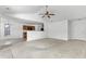 Living room with hardwood floors, open concept to kitchen, and vaulted ceiling at 605 West Perry Rd., Myrtle Beach, SC 29579