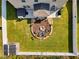 Aerial view of backyard oasis with hot tub and fire pit at 623 Meadowgrass Ct., Myrtle Beach, SC 29588