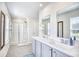 Double vanity bathroom with a large walk-in shower and neutral tones at 623 Meadowgrass Ct., Myrtle Beach, SC 29588