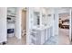 Bathroom with double vanity, toilet and linen closet at 623 Meadowgrass Ct., Myrtle Beach, SC 29588