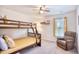 Bunk bed bedroom with a relaxing chair and window seat at 623 Meadowgrass Ct., Myrtle Beach, SC 29588