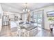 Bright dining area with seating for four, adjacent to the kitchen and living area at 623 Meadowgrass Ct., Myrtle Beach, SC 29588